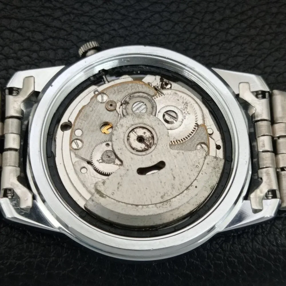 Vintage 1982 Seiko Automatic Mens Silver Watch W/daydate & Champagne accents